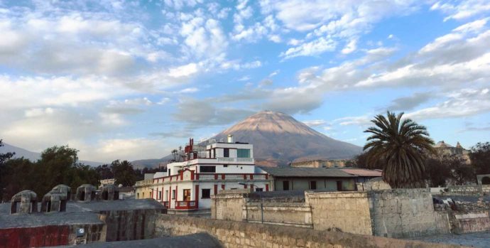 Inside Santa Catalina. Exploring Arequipa. Volcano in the distance.