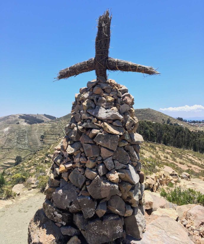 Overview of Lake Titicaca. Isla del Sol stack of prayer stones