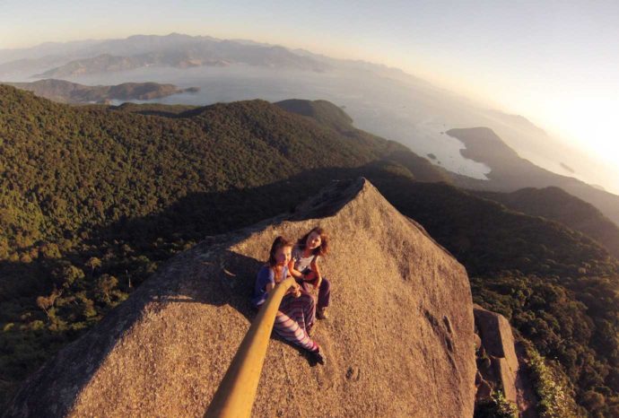 6 things to do on Ilha Grande. Sunrise walk up Pico do Papagaio. Me and Rachel at the peak with go pro