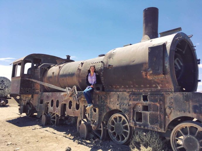 3 day salt flat tour. Day 1 train cementery. me sat on train