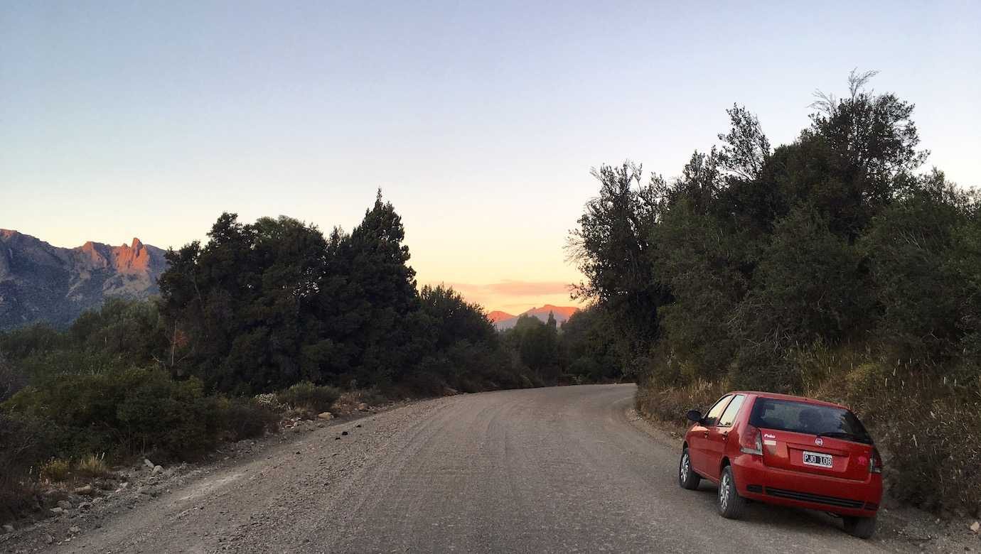 7 lakes drive Bariloche car road sunset
