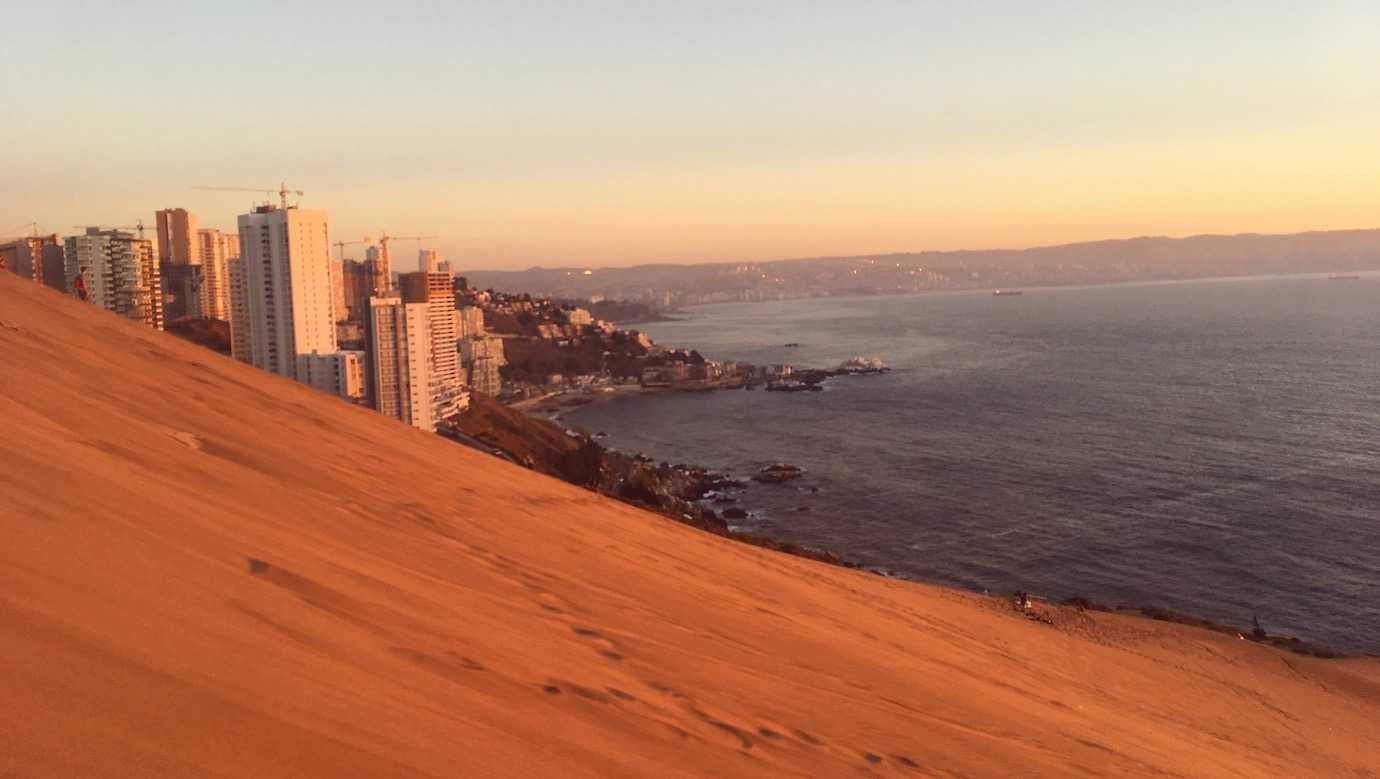 sand dunes and city sunset valparaiso