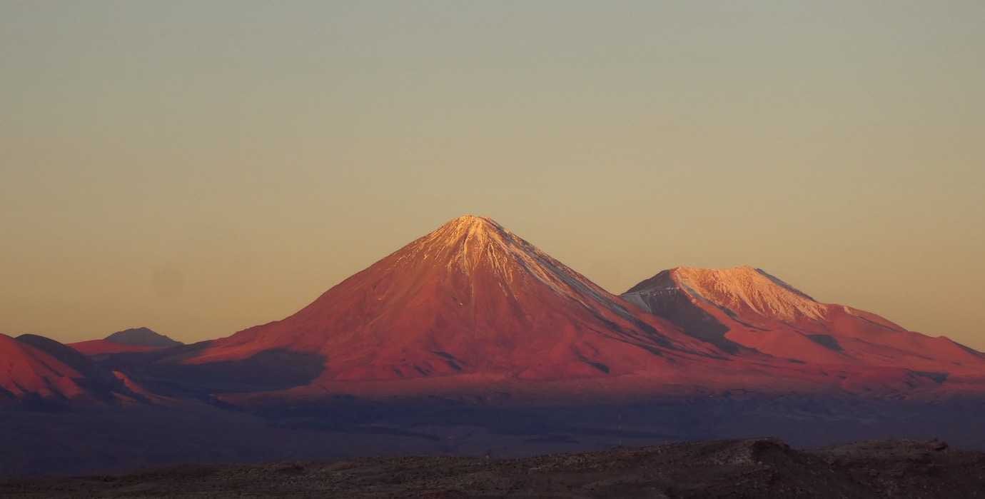 volcano at sunset atacama desert