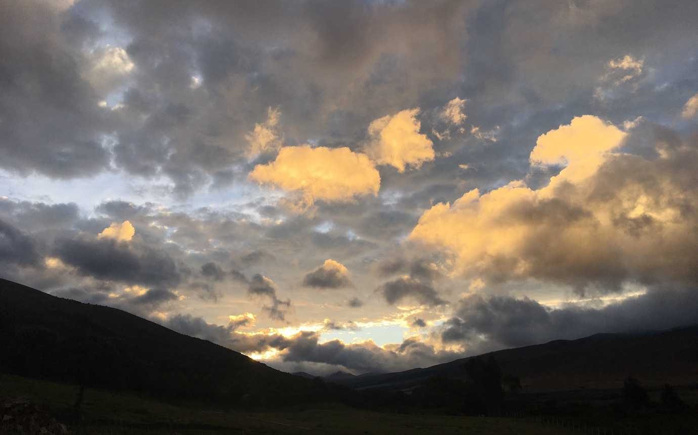 sunrise clouds secret garden cotopaxi