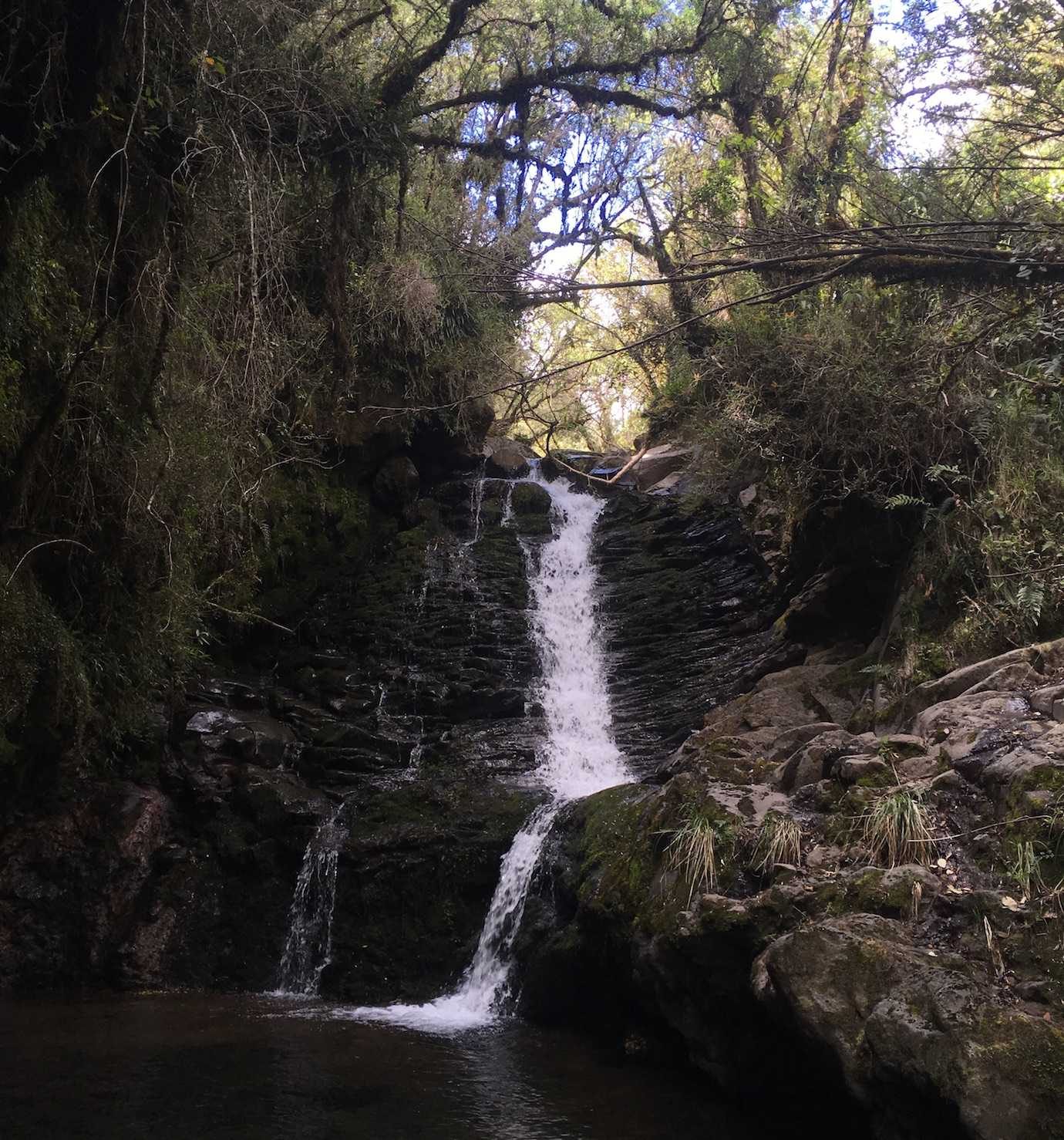 waterfall hike secret garden cotopaxi