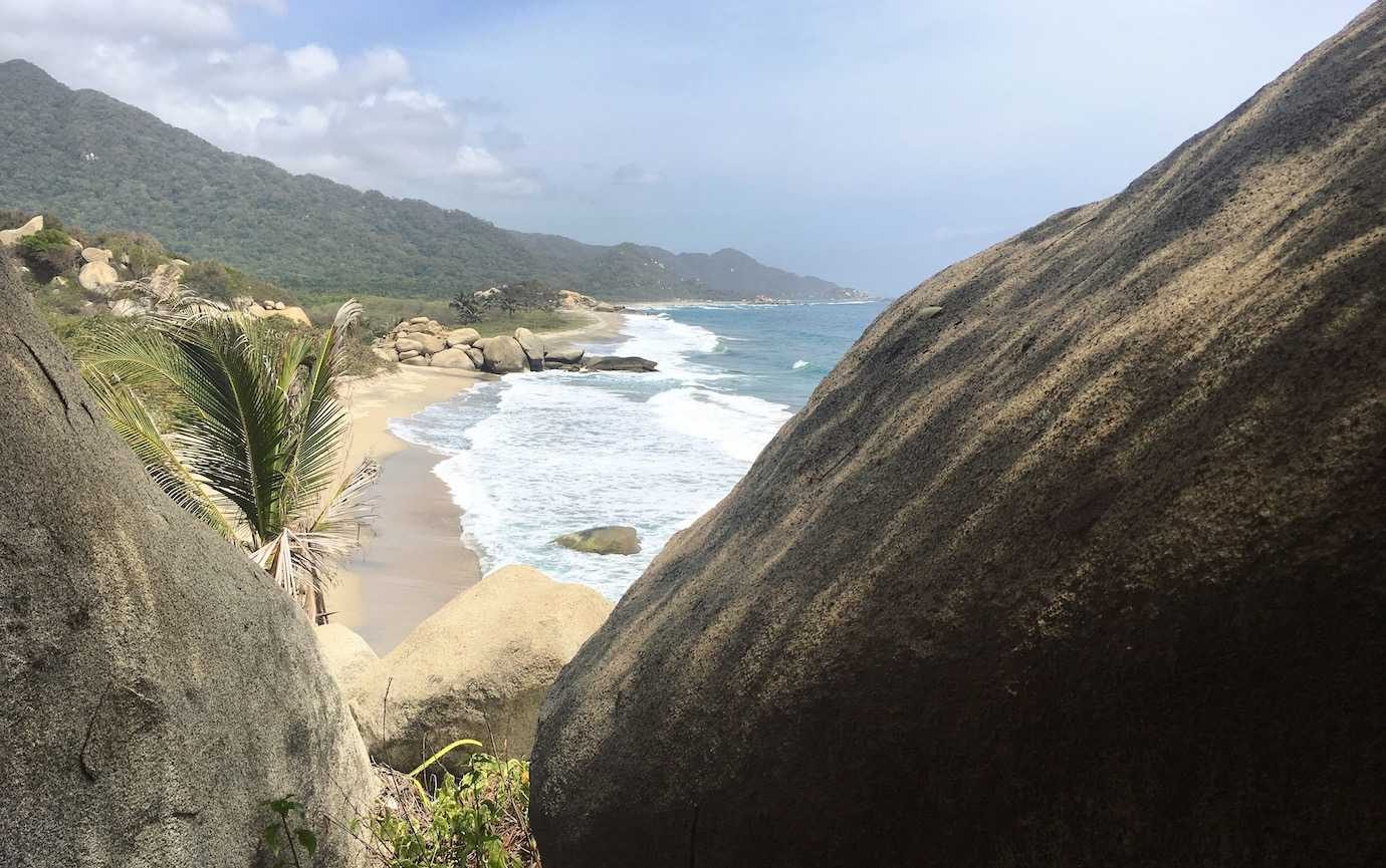 arrecife beach through rocks tayrona national park