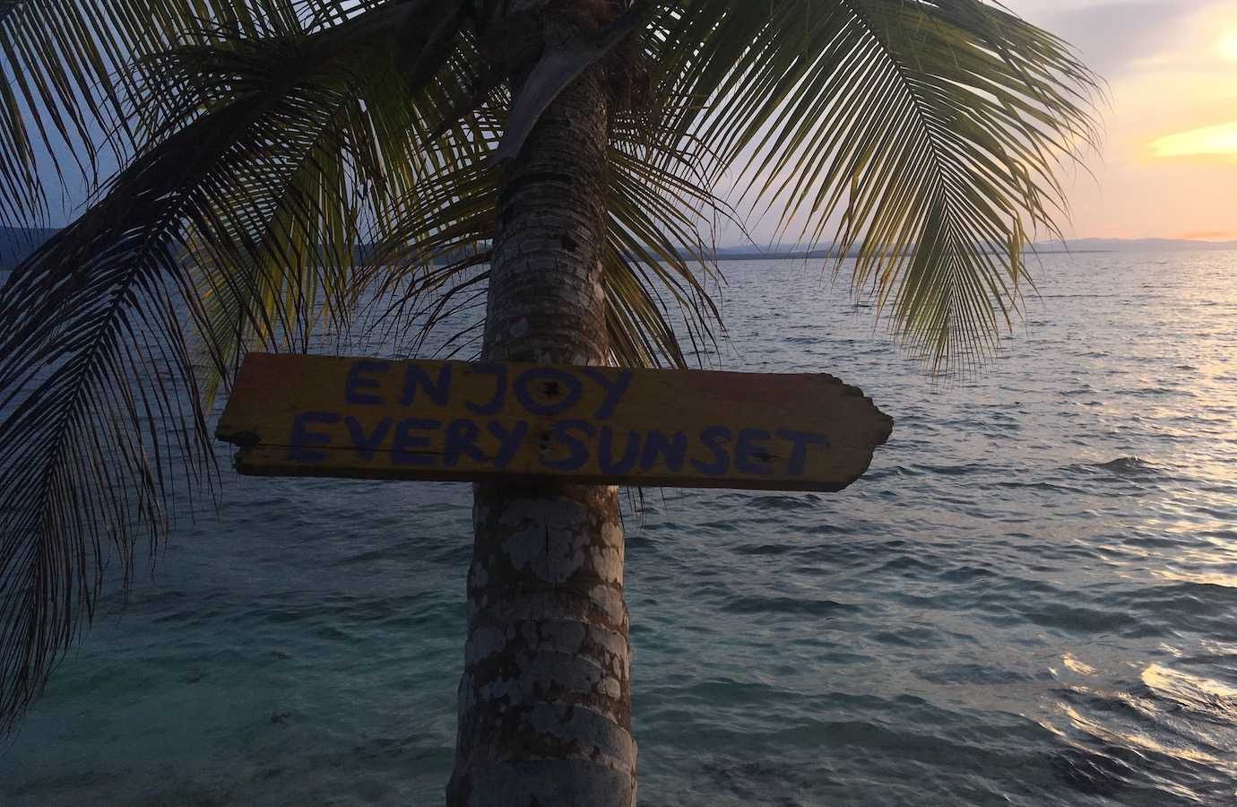 enjoy every sunset sign san blas islands
