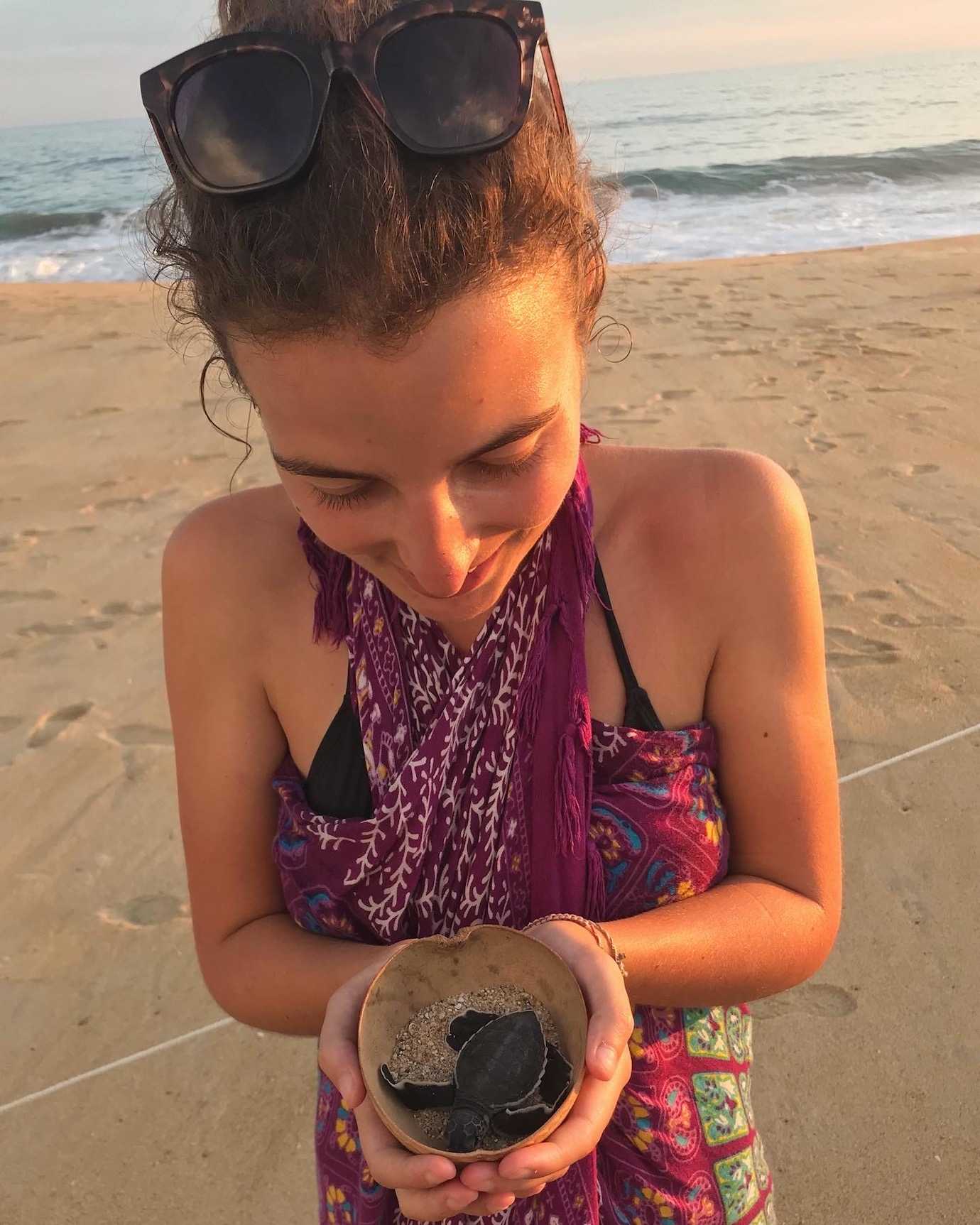 me holding turtle playa bacocho puerto escondido